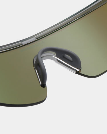 Transparent løbe briller, grøn glas, tæt detalje billede