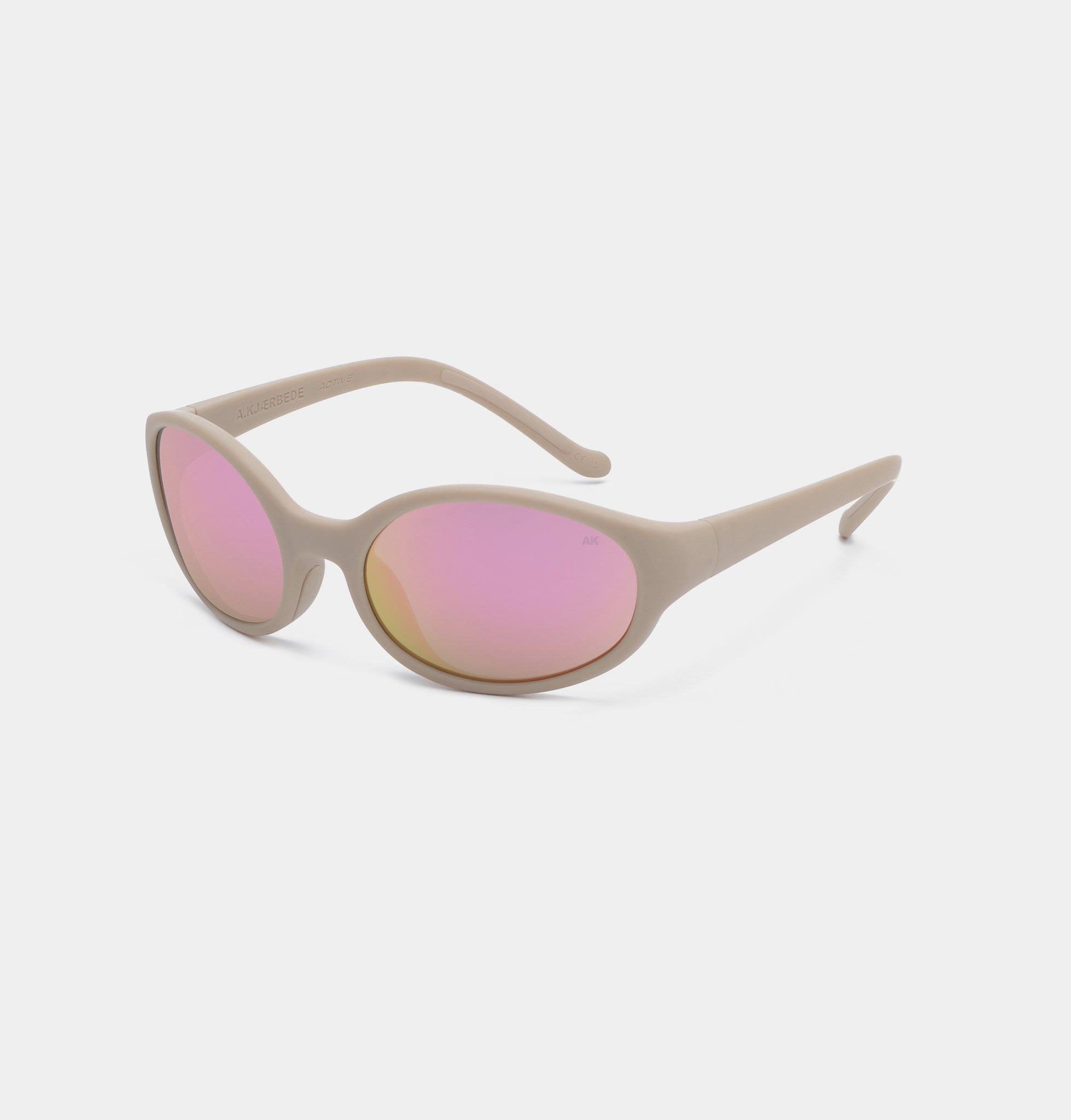 Lyse runde A.Kjærbede løbesolbriller med pink glas - Set fra siden