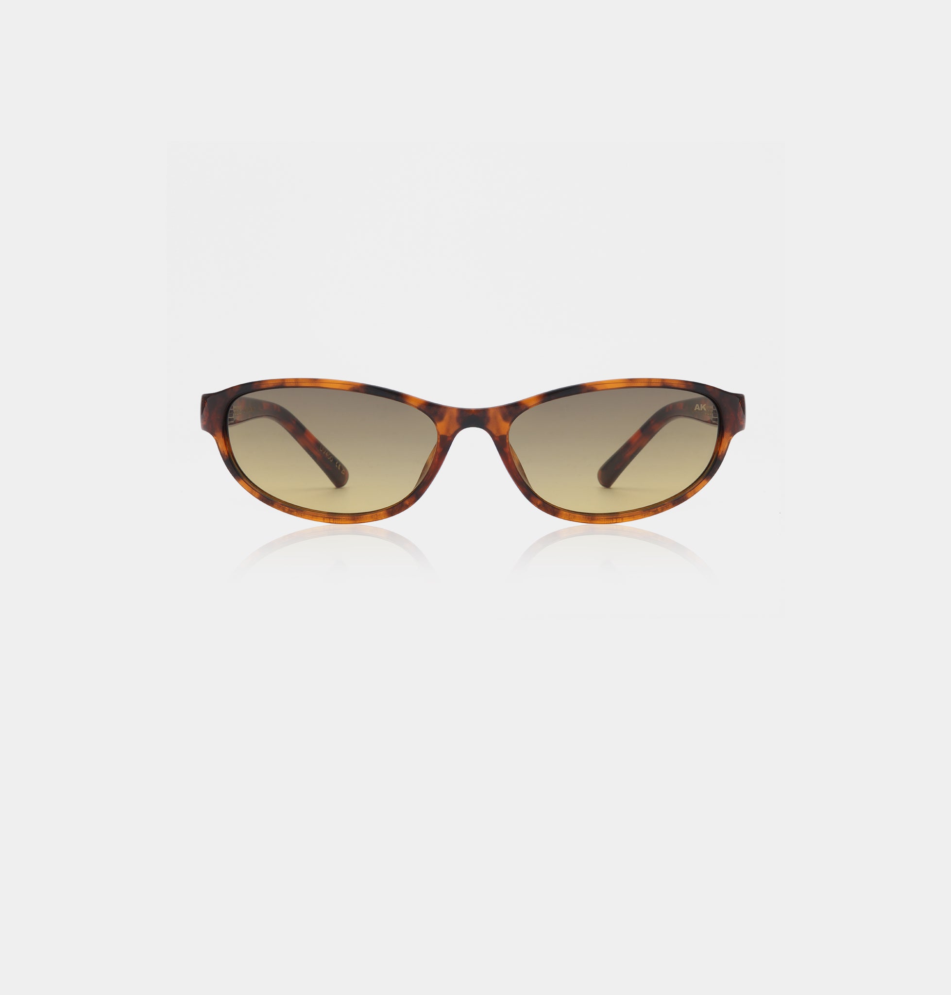 Smalle cat-eye plettede brune A.Kjærbede solbriller med gul glas